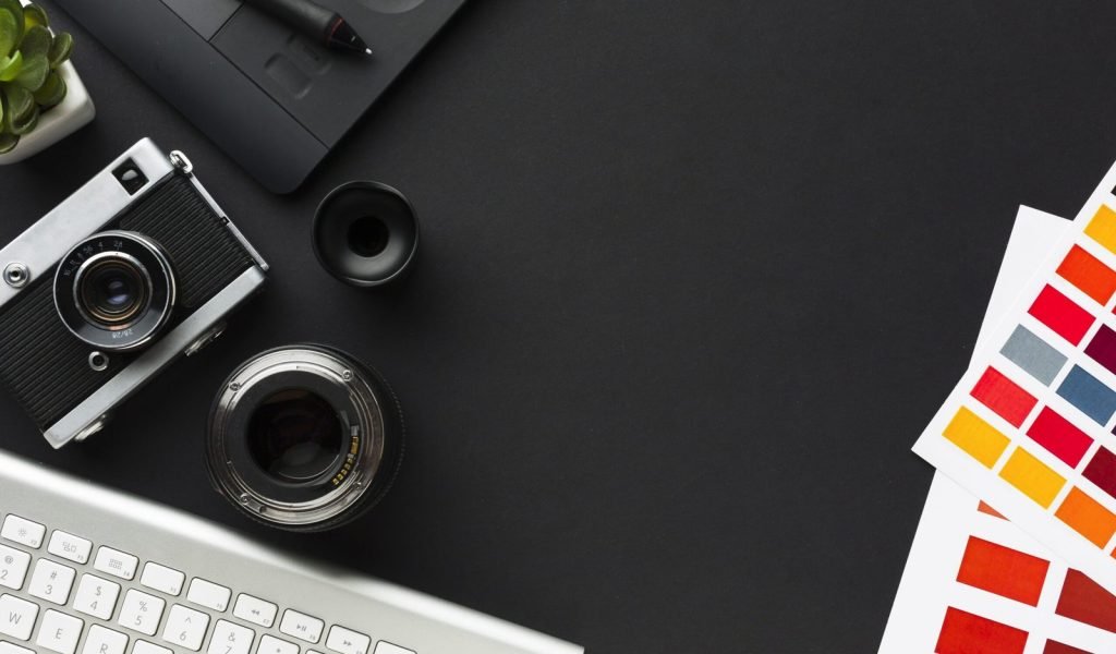 top-view-desk-with-keyboard-drawing-pad-scaled
